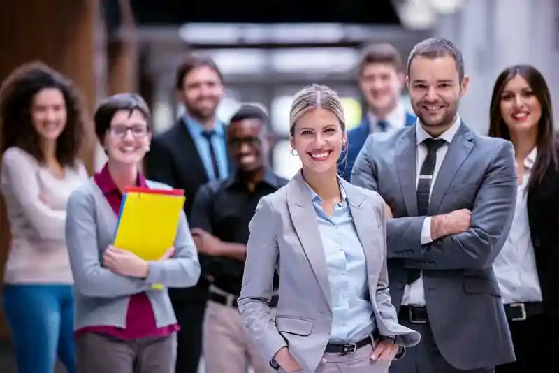 Human Resources team standing in hallway